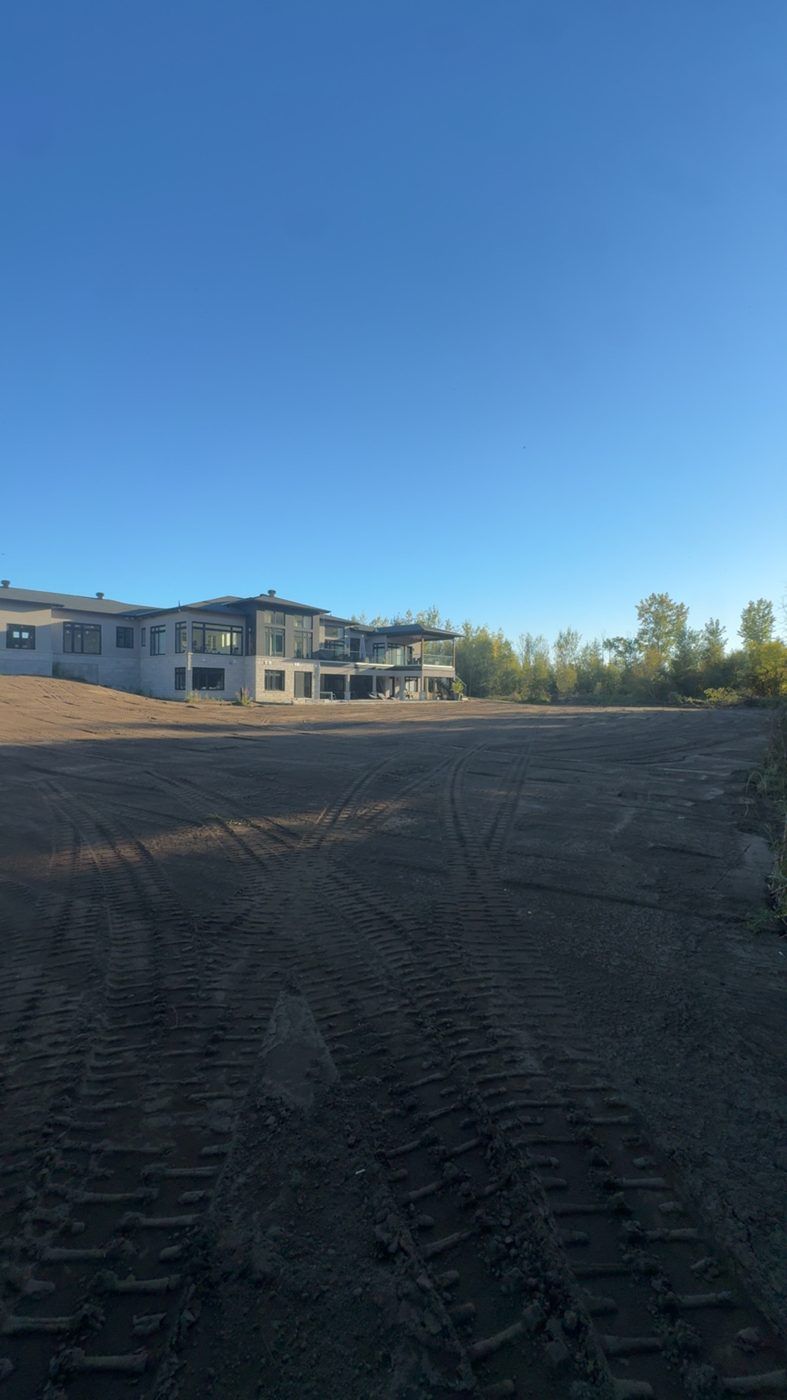 Large rear yard rough-graded behind a new home
